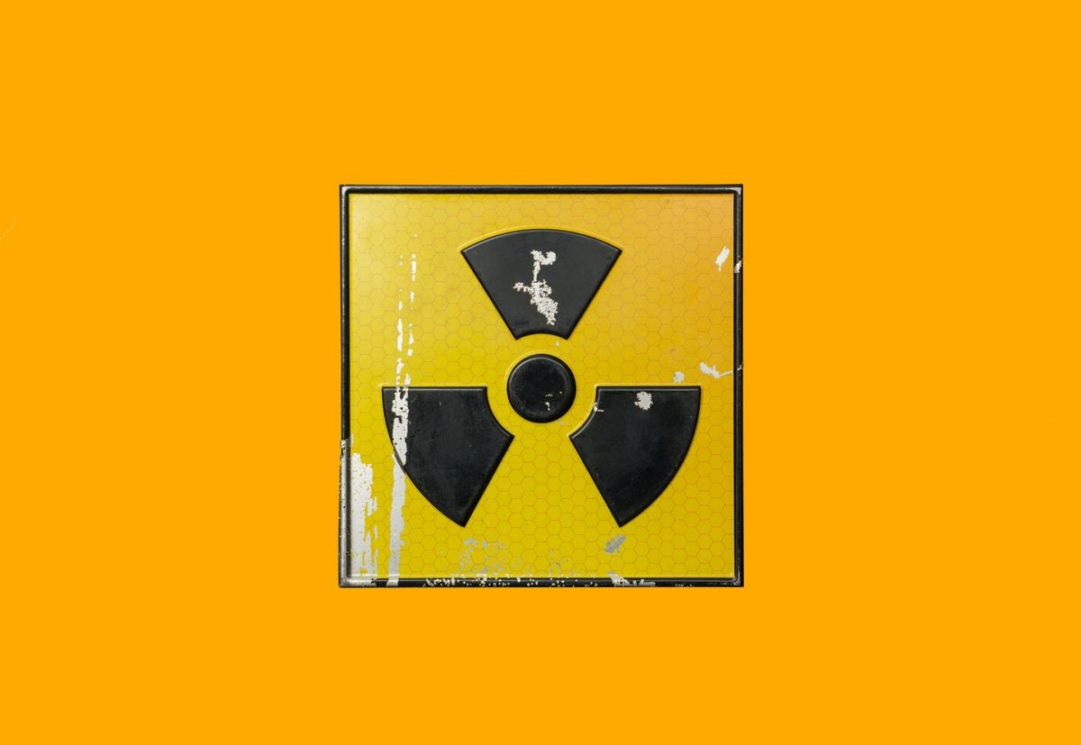 radioactive sign on yellow background